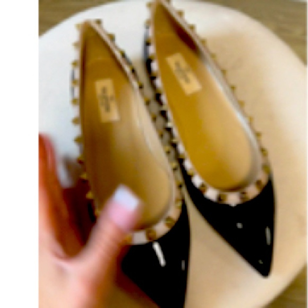 Brand new, never worn. Valentinos with rock studs.